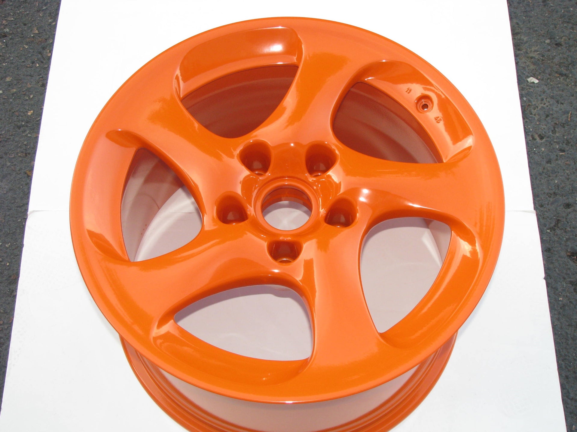 Orange powder coating on alloy rim